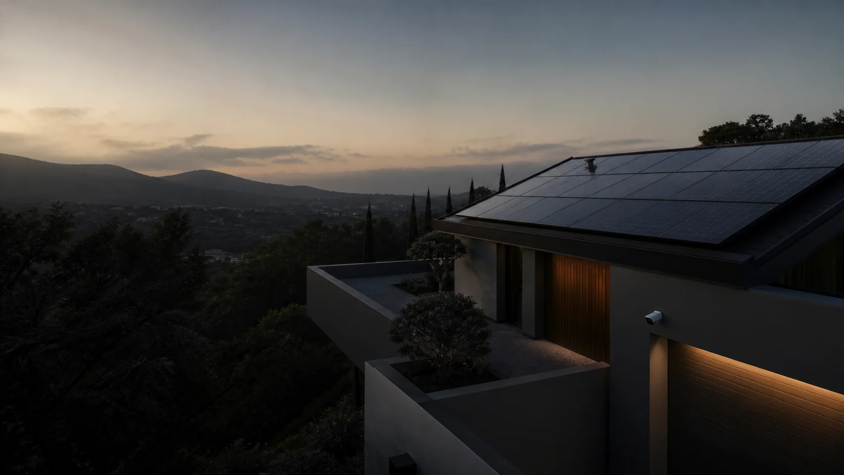 Abitazione contemporanea con copertura fotovoltaica in un paesaggio collinare